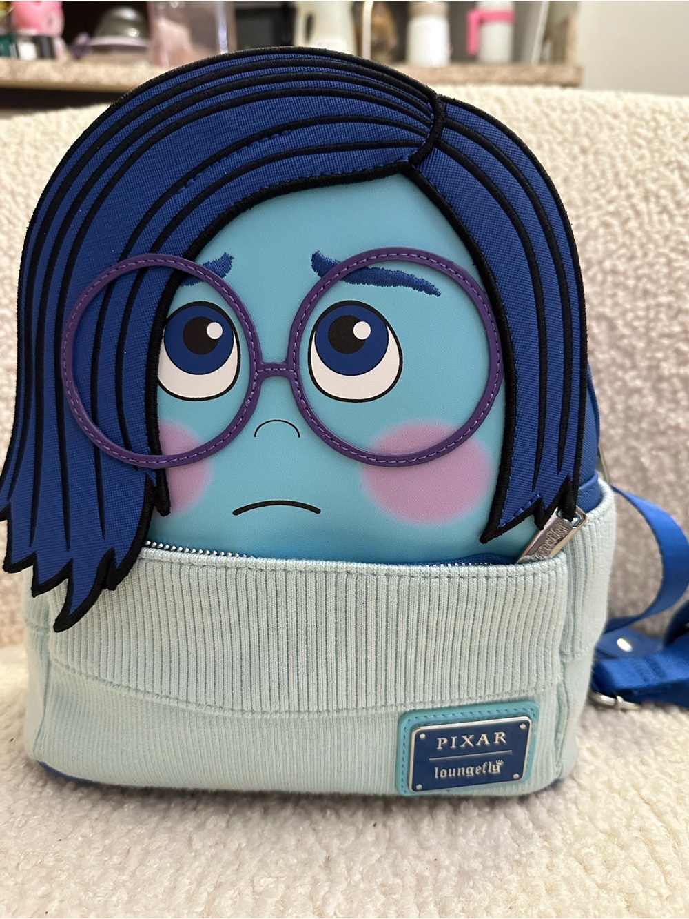 Loungefly Pixar Sadness Blue Mini Backpack with Purple Glasses